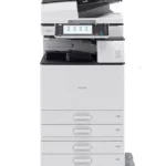MP6054, impressora Ricoh preta e branca, ideal para impressões rápidas e eficientes em ambientes corporativos.